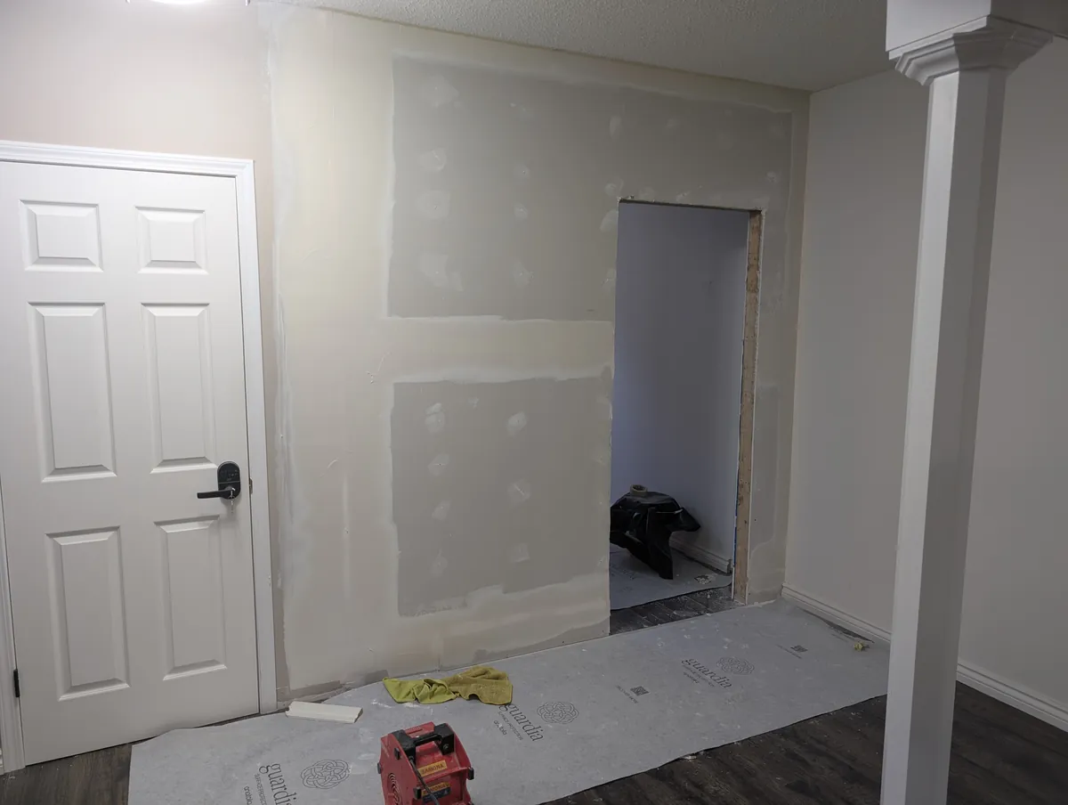 Wall addition with framing, drywall and finishing, West Edmonton