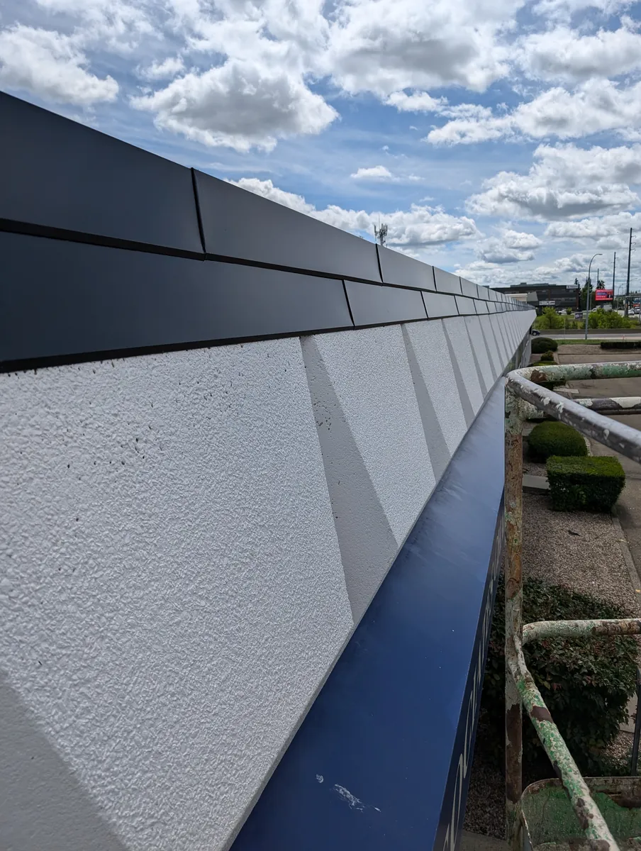 Commercial stucco and cladding exterior repaint near Whitemud, South Edmonton
