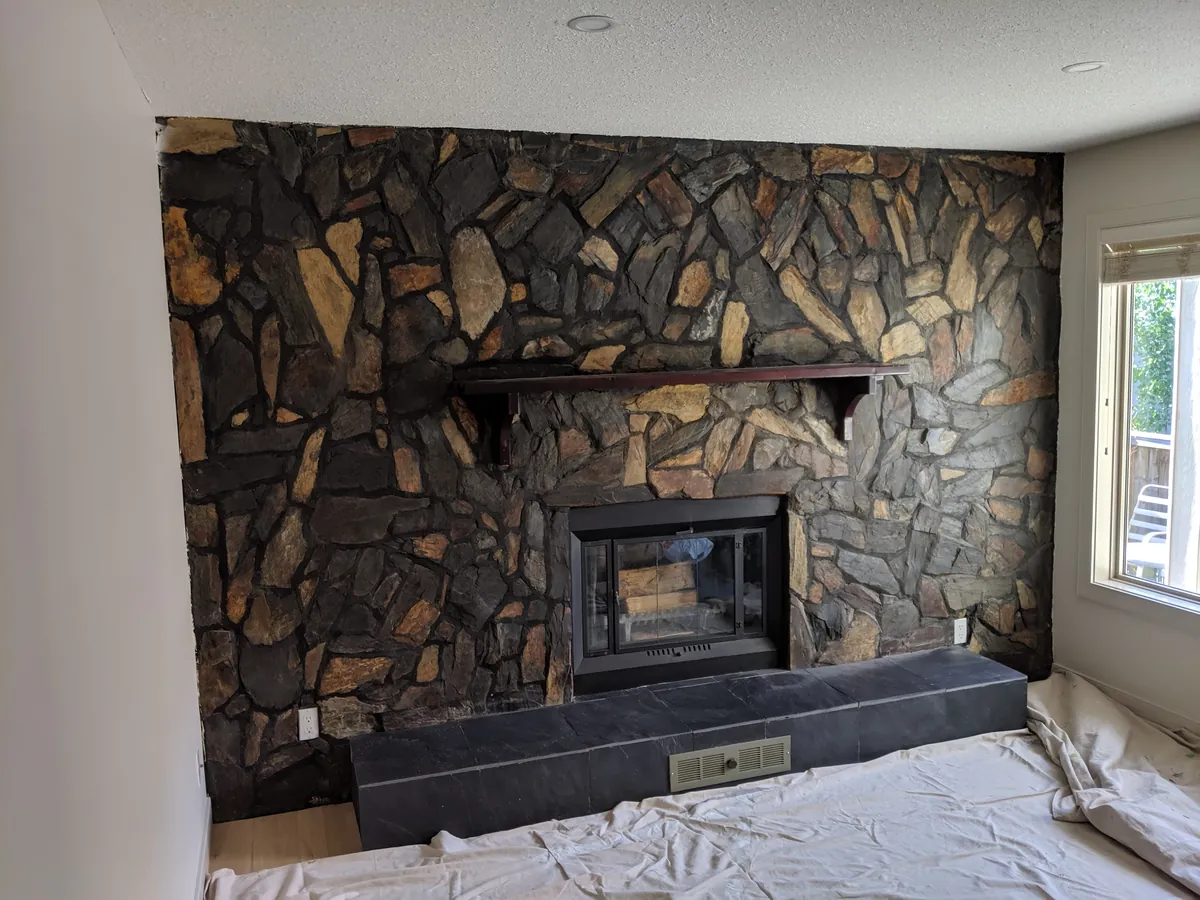 Stone fireplace feature wall repaint, North Edmonton