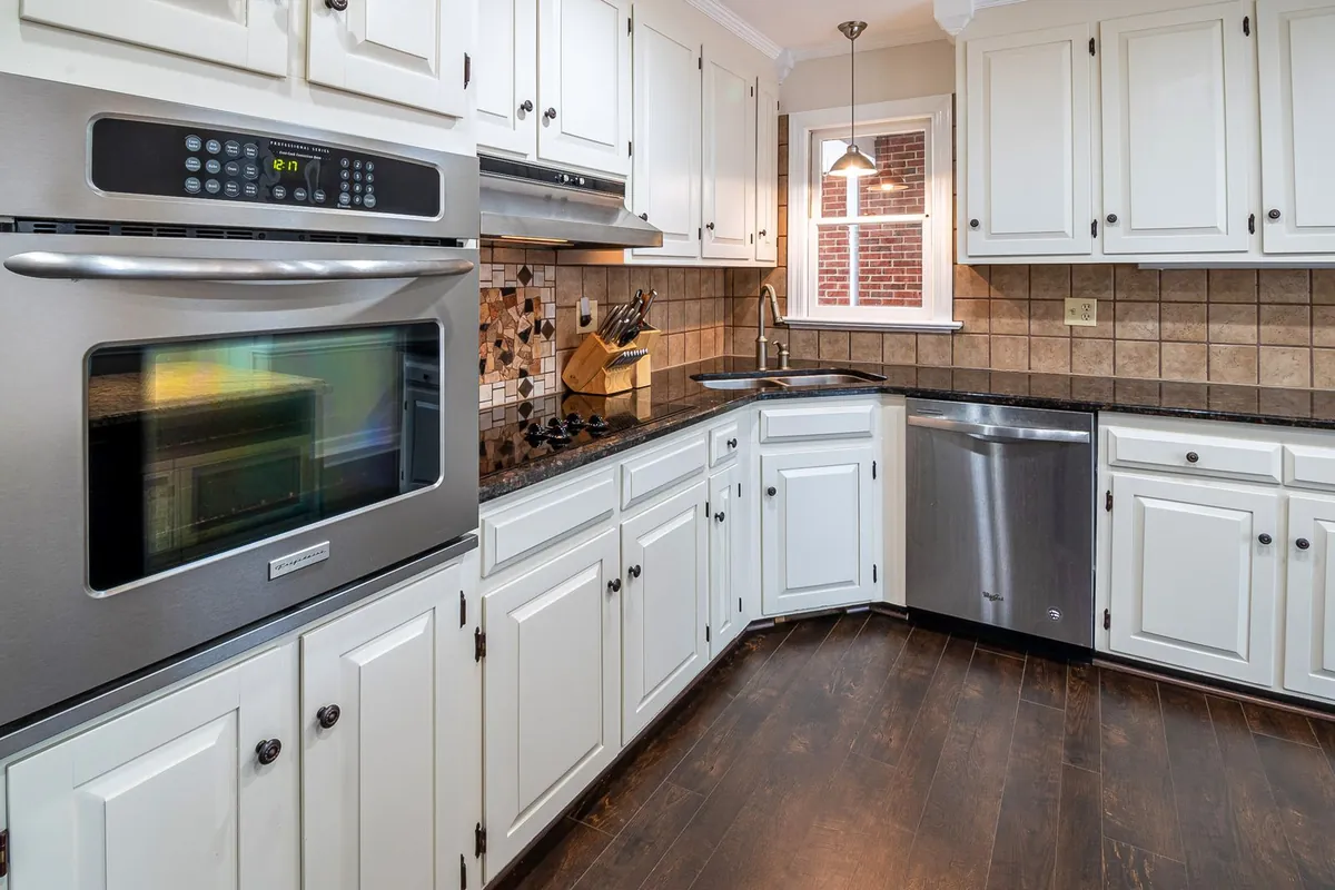 Cabinet refinishing with a durable spray-grade finish